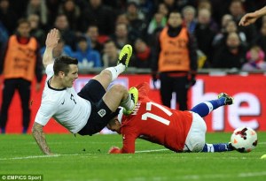 Chile are a tough tackling side as England found out recently (Image from PA)