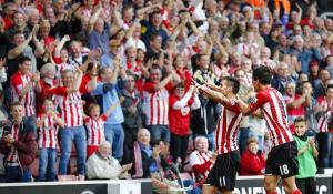 All Smiles - Southampton fans cheer as their side destroys Sunderland 8-0  (Image from AFP)