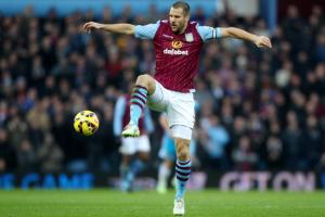 Ron Vlaar is one of 154 players released by their Premiership clubs  (Image from AFP)